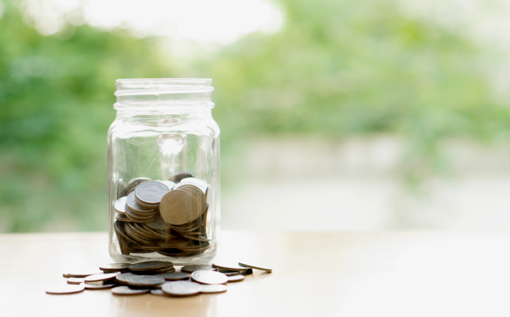 Mason jar full of coins